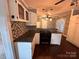 Modern kitchen offers stainless steel appliances, stylish countertops, and mosaic backsplash at 131 Glendale Se Ave, Concord, NC 28025