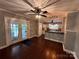 Open floor plan offers great room, dining area, and eat-in kitchen with granite counters at 131 Glendale Se Ave, Concord, NC 28025