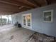 Covered patio features direct access to the backyard, screened-in porch and natural light at 131 Glendale Se Ave, Concord, NC 28025
