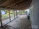 A screened-in porch with concrete flooring provides an excellent outdoor space at 131 Glendale Se Ave, Concord, NC 28025