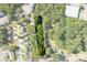 Aerial view of a rectangular lot, surrounded by houses and trees at 3444 Marvin Rd, Charlotte, NC 28211