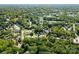 Wide aerial view of a suburban neighborhood with lush greenery at 3444 Marvin Rd, Charlotte, NC 28211