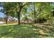 White house, needs renovation, front yard view at 3444 Marvin Rd, Charlotte, NC 28211