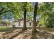 White house exterior, side view, needs renovation at 3444 Marvin Rd, Charlotte, NC 28211