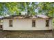 White house exterior, rear view, needs renovation at 3444 Marvin Rd, Charlotte, NC 28211