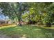 Small white house, needs renovation, front yard view at 3444 Marvin Rd, Charlotte, NC 28211