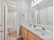 Bathroom with double vanity, light wood cabinets, and a shower/tub at 3481 Fieldstone Dr, Gastonia, NC 28056
