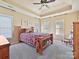 Spacious bedroom with carpeted floor, ceiling fan, and ample natural light at 3481 Fieldstone Dr, Gastonia, NC 28056