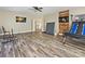 Spacious bonus room with hardwood floors, a ping pong table and basketball game at 3481 Fieldstone Dr, Gastonia, NC 28056