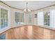 Bright breakfast area with hardwood floors and large windows overlooking the pool at 3481 Fieldstone Dr, Gastonia, NC 28056