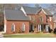 Brick two-story house with attached garage and landscaped lawn at 3481 Fieldstone Dr, Gastonia, NC 28056