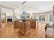 Well-equipped kitchen with light wood cabinets, an island, and stainless steel appliances at 3481 Fieldstone Dr, Gastonia, NC 28056