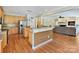 Eat-in kitchen boasts stainless steel appliances and hardwood floors at 3481 Fieldstone Dr, Gastonia, NC 28056
