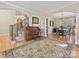 Spacious living room with hardwood floors and access to dining area at 3481 Fieldstone Dr, Gastonia, NC 28056