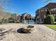 Brick patio with fire pit, offering a relaxing outdoor space at 3481 Fieldstone Dr, Gastonia, NC 28056