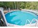 Refreshing above ground pool with wooden deck at 3481 Fieldstone Dr, Gastonia, NC 28056