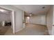 Open loft area with neutral walls and carpet floors at 1000 Hunting Ave, Lincolnton, NC 28092