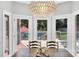 Bright dining area with access to deck and views of the backyard pool at 1134 Willow Oaks Trl, Matthews, NC 28104