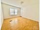 Bright bedroom with wood floors and natural light at 125 Pineville Rd, Statesville, NC 28677