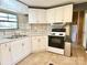 Well-lit kitchen with updated appliances and counter space at 125 Pineville Rd, Statesville, NC 28677