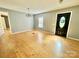 Spacious living room features attractive hardwood floors and natural light at 125 Pineville Rd, Statesville, NC 28677