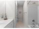 Clean bathroom with shower/tub combo and white vanity at 155 Harper Lee St, Davidson, NC 28036