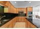 Kitchen with stainless steel appliances and granite countertops at 155 Harper Lee St, Davidson, NC 28036