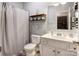 Simple bathroom with shower/tub combo and vanity at 7324 Friar Tuck Ln, Mint Hill, NC 28227