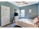 Bedroom with a queen-size bed, dresser, and ceiling fan at 7324 Friar Tuck Ln, Mint Hill, NC 28227