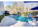 Inviting in-ground pool with safety cover, surrounded by patio at 7324 Friar Tuck Ln, Mint Hill, NC 28227