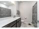 Clean bathroom, featuring a shower/tub combo, vanity with dark brown cabinets, and white countertop at 112 Atterberry Aly, Charlotte, NC 28217