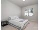 Spacious bedroom with queen bed and window at 112 Atterberry Aly, Charlotte, NC 28217