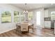 Dining area with hardwood floors and view of kitchen at 112 Atterberry Aly, Charlotte, NC 28217