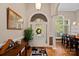 Bright entryway with hardwood floors and stained glass door at 115 Hawk Run Ln, Troutman, NC 28166