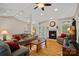 Spacious living room, featuring hardwood floors and fireplace at 115 Hawk Run Ln, Troutman, NC 28166