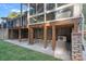 Under-deck storage area with concrete flooring and HVAC unit at 115 Hawk Run Ln, Troutman, NC 28166