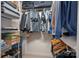 Well-organized walk-in closet with hanging rods and shelves at 115 Hawk Run Ln, Troutman, NC 28166