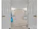 Bathroom with double sinks and vanities, framed mirrors, and neutral walls at 13079 Philadelphia Church Rd, Oakboro, NC 28129