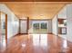 Inviting living room with hardwood floors and a large window overlooking the exterior at 13079 Philadelphia Church Rd, Oakboro, NC 28129