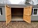 Interior view of the shed featuring opened double doors at 337 Autumn Dr, Harrisburg, NC 28075