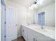 Bathroom boasts double vanity with modern light fixtures at 34 Porter Nw St # Sw34, Concord, NC 28027