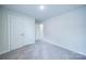 Bright bedroom with neutral carpeting and double door closet at 34 Porter Nw St # Sw34, Concord, NC 28027