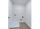 Laundry room with shelving and drain in the floor at 34 Porter Nw St # Sw34, Concord, NC 28027