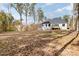 Rear view of home, showcasing wooded backyard at 1025 Readsboro Dr # 11, Mt Ulla, NC 28125