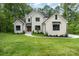 Stunning brick home featuring a manicured lawn and charming walkway at 1025 Readsboro Dr # 11, Mt Ulla, NC 28125