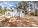 Rear exterior view of home, showcasing back of the home and garage at 1025 Readsboro Dr # 11, Mt Ulla, NC 28125