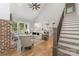 Open-concept living room with fireplace and adjacent kitchen area at 1025 Readsboro Dr # 11, Mt Ulla, NC 28125