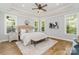 Spacious main bedroom features tray ceiling, ceiling fan, and many bright windows at 1025 Readsboro Dr # 11, Mt Ulla, NC 28125