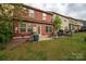 Cozy backyard featuring a patio area and a well-maintained grassy yard at 2446 Alyssa Ln, Charlotte, NC 28208