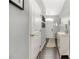 Modern entryway featuring dark hardwood floors, grey walls, and ample natural light at 2446 Alyssa Ln, Charlotte, NC 28208